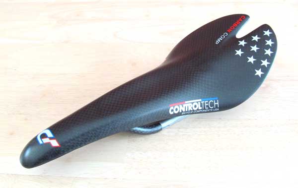 CARBON COMP SADDLE - Click Image to Close